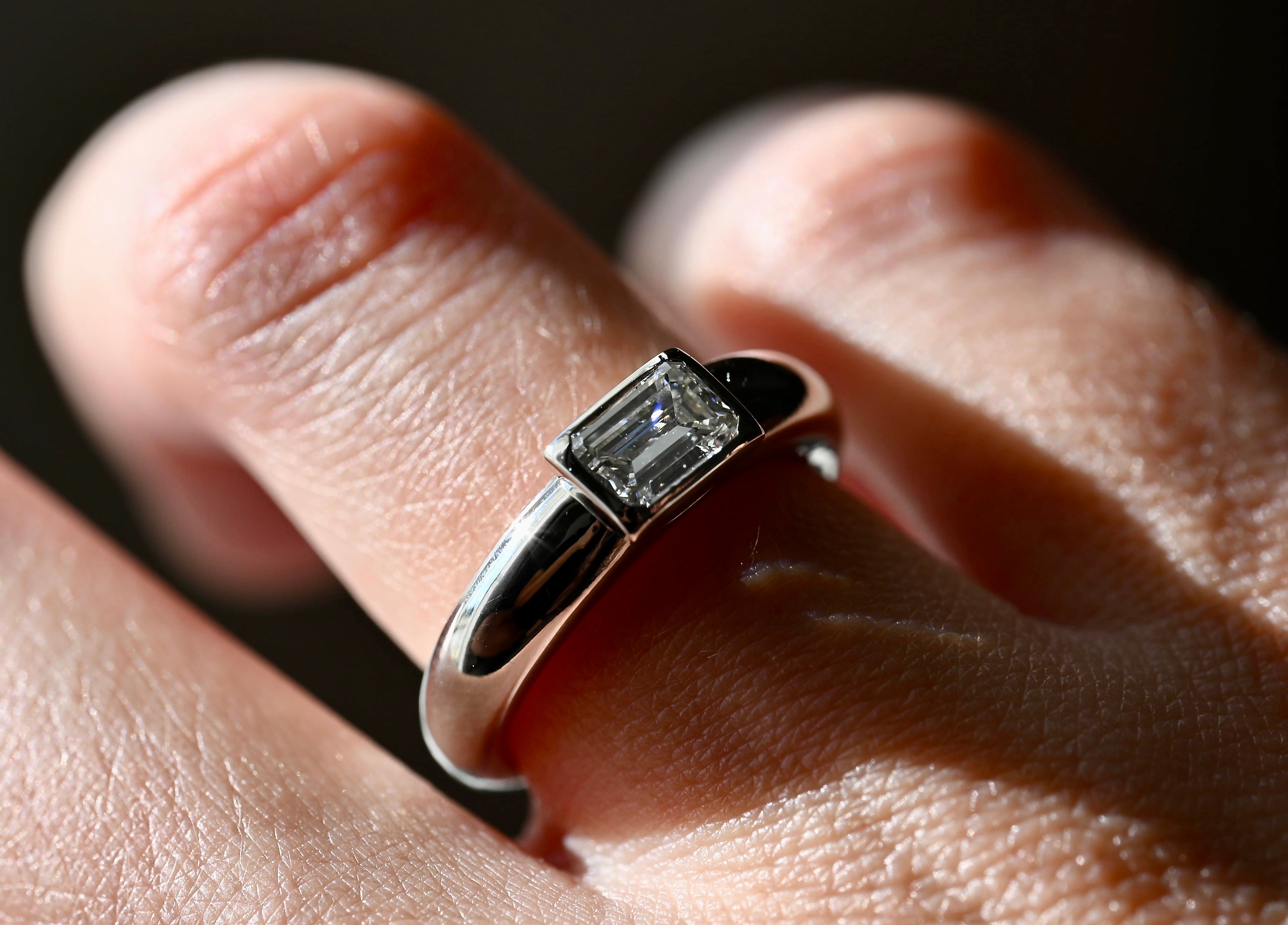 0.60 Carat Emerald Cut Diamond Ring in Platinum